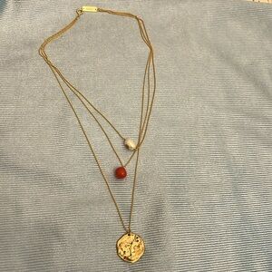 Carolina Herrera Scorpio triple necklace gold